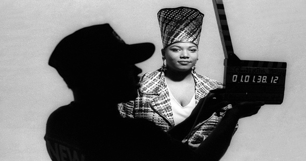 Queen Latifah (Dana Owens) is seen with the film Slate in the foreground on set during Queen Latifah's music video shoot 